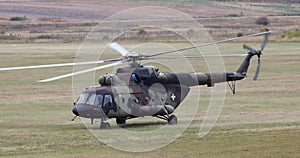 Military helicopter standing on the ground