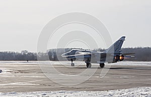 Military jet bomber Su-24 Fencer afterburner takeoff