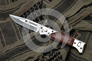 Military knife on SHEMAGH photo