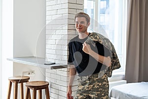 military man in new apartments