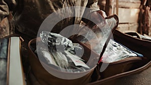 Military Medic Woman Preparing Medical Kit, Ready for Field Operations