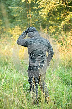 Military men with automatic weapons getting ready to play airsoft