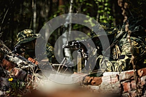 Military men with submachine gun
