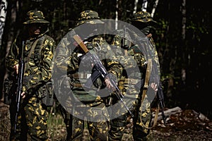 Military men with submachine gun