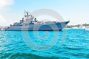 Military navy ship in blue sea
