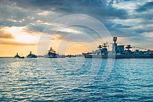 Military navy ships in a sea bay