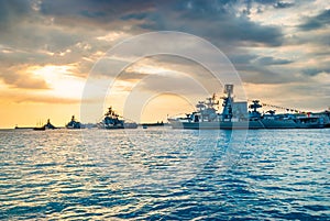 Military navy ships in a sea bay