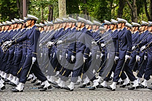 Military parade (Defile) during the ceremonial of french national day, Champs Elysee avenue.