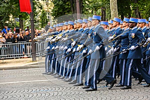 Military parade (Defile) during the ceremonial of french national day, Champs Elysee avenue.