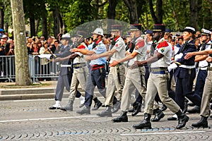 Military parade Defile during the ceremonial of french national day, Champs Elysee avenue.