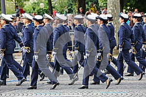 Military parade (Defile) during the ceremonial of french national day, Champs Elysee avenue.