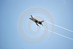 Military plane acrobatic exercise