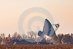 Military radar at sunset.