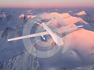 military RC military drone flies against the background of beautiful Arctic ice mountains painted pink by the sunset sun. Elements