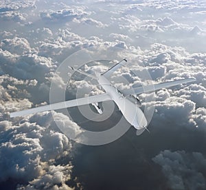 military RC military drone flies flies against backdrop of beautiful clouds on blue sky background. Elements of this image