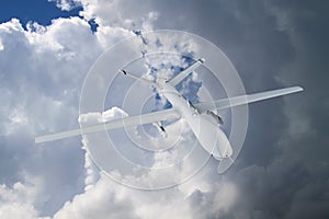 military RC military drone flies flies against backdrop of beautiful ominous clouds on blue sky background