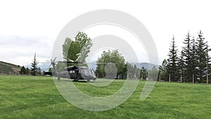 Military rescue helicopter ready for the taking off at the countryside