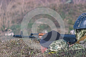 Military soldiers with kalashnikov gunfire