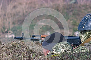Military soldiers with kalashnikov gunfire photo