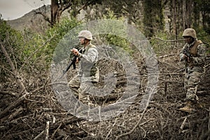 Military soldiers during training exercise with weapon