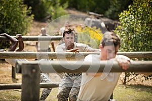 Military soldiers training on fitness trail