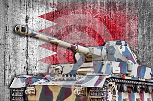 Military tank with concrete Bahrein flag photo
