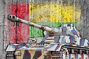 Military tank with concrete Guinea Bissau flag