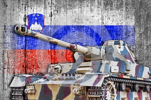 Military tank with concrete Slovenia flag photo