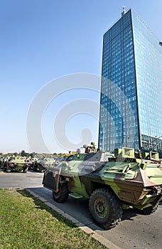 Military tanks invade city