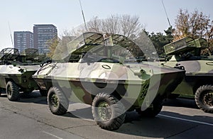 Military tanks invade city photo