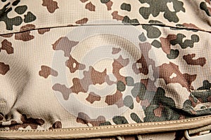 Military texture camouflage background close-up