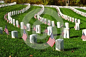 Military tombstones with American flags