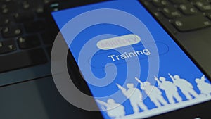 Military Training inscription on smartphone screen with blue background. Graphic presentation with silhouette of a group