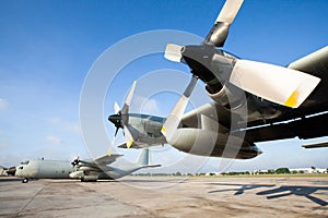 Military transport aircraft on runway at an airport in Asia, are primarily used to transport troops and war supplies