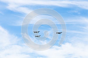 Military transport aircrafts in white clouds