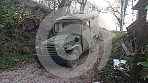 Military vehicle exponent in the wood walking path