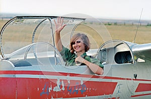 Military woman in glider