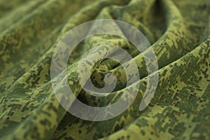 Military wrinkled camouflage fabric photo