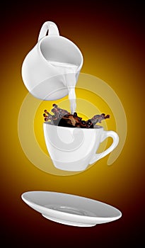 Milk being poured into small cup of coffee. 3d