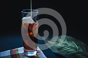 Milk being poured to cold brew coffee