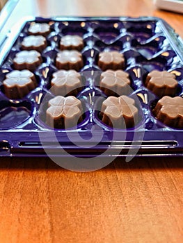 Milk bonbons in clover shape