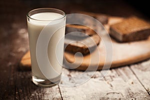 Milk and bread on table. still life