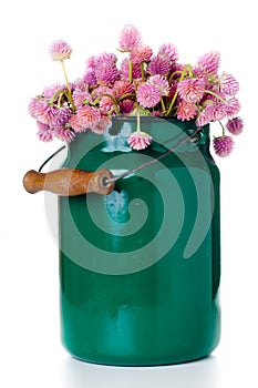 Milk can and a bouquet