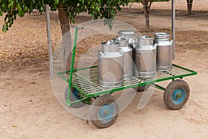 Milk cans on a cart