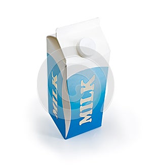 Milk carton with pasteurized milk on a white background photo