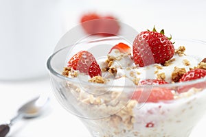 Milk with cereal and strawberries