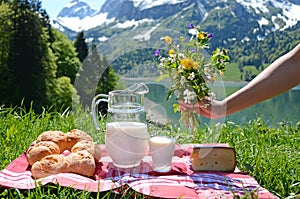 Milk, cheese and bread served at a