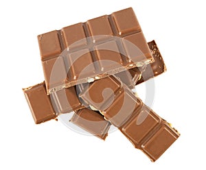 Milk chocolate bars with hazelnuts isolated on a white background