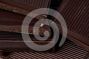 Milk chocolate bars stack for background, close up