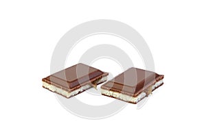 Milk chocolate with milk filling and caramel isolated on white background.